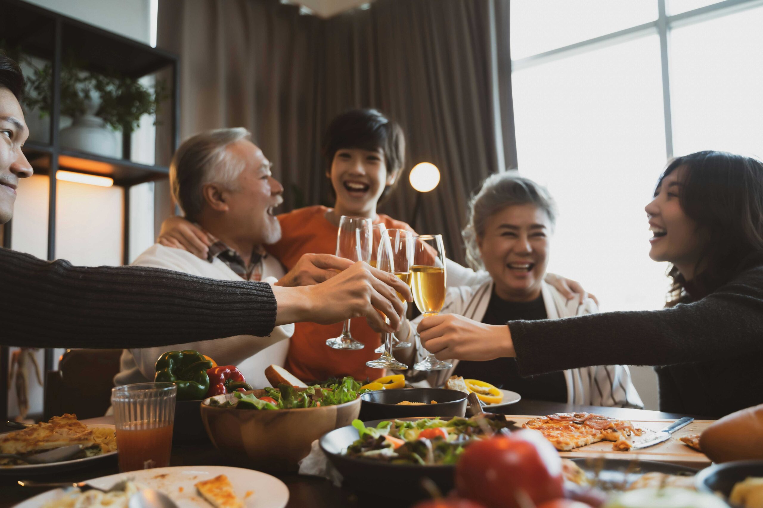 therapy for grief.  Generations of Family Eating Together.