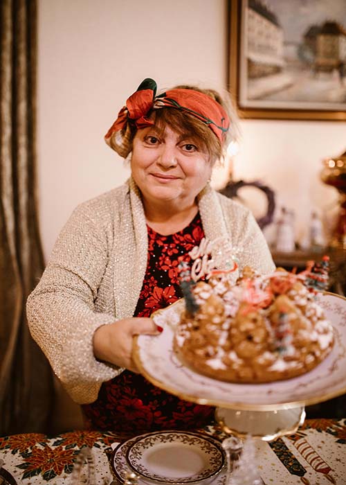 family self-care balance holidays.  Mom with holiday cake.